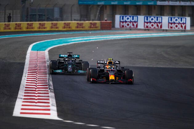 11 Sergio Perez MEX, Red Bull Racing , 44 Lewis Hamilton GBR, Mercedes AMG Petronas F1 Team , F1 Grand Prix of Abu Dhabi at Yas Marina Circuit on December 12, 2021 in Abu Dhabi, United Arab Emirates Photo by HOCH ZWEI Abu Dhabi United Arab Emirates