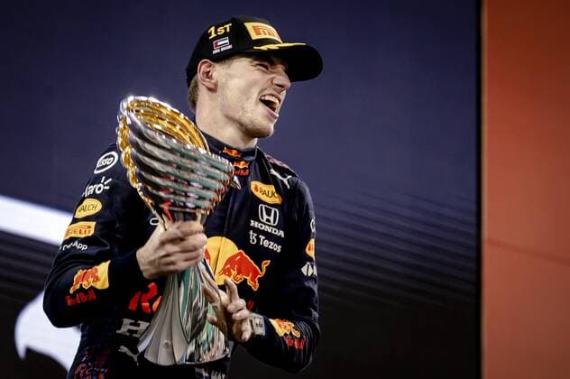 ABU DHABI Red Bull Racing s Max Verstappen on the podium after winning the Formula 1 World Championship after the Abu Dhabi Grand Prix at Yas Marina Circuit on December 12, 2021 in Abu Dhabi, United Arab Emirates REMKO DE WAAL F1 Grand Prix 2021 xVIxANPxSportx xxANPxIVx 441982376