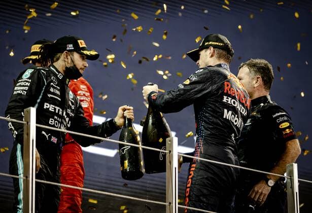 ABU DHABI Mercedes Lewis Hamilton and Red Bull Racing s Max Verstappen on the podium after winning the Formula 1 World Championship after the Abu Dhabi Grand Prix at Yas Marina Circuit on December 12, 2021 in Abu Dhabi, United Arab Emirates REMKO DE WAAL F1 Grand Prix 2021 xVIxANPxSportx xxANPxIVx 441985013