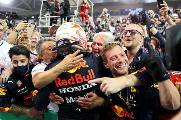 F1 Grand Prix of Abu Dhabi 33 Max Verstappen (NED, Red Bull Racing) celebrates becoming the 2021 Drivers World Champion with Masashi Yamamoto (JPN, F1 General Manager Honda), Dr. Helmut Marko (AUT, Red Bull Racing), F1 Grand Prix of Abu Dhabi at Yas Marina Circuit on December 12, 2021 in Abu Dhabi, United Arab Emirates. (Photo by xpbimages.com XPB Images FIA Pool via HOCH ZWEI) Abu Dhabi United Arab Emirates Poolfoto HOCH ZWEI Pool XPB Images ,EDITORIAL USE ONLY