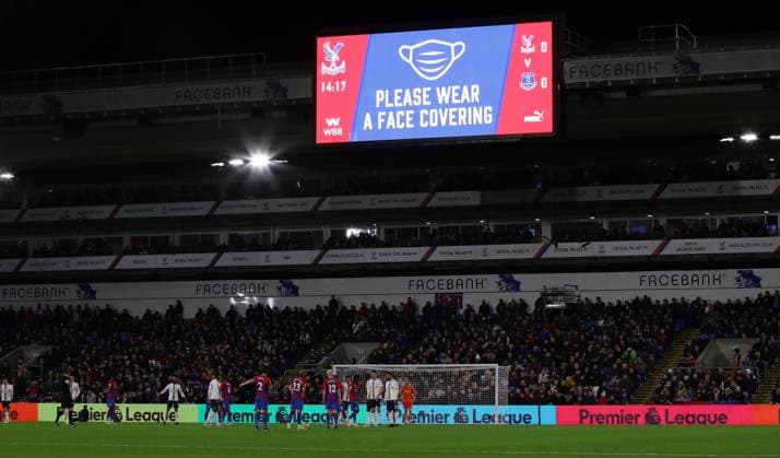 London, England, 12th December 2021. A message on the stadium screen advising to wear a mask to stop Covid transmission during the Premier League match at Selhurst Park, London. Picture credit should read: David Klein Sportimage EDITORIAL USE ONLY. No use with unauthorised audio, video, data, fixture lists, club league logos or live services. Online in-match use limited to 120 images, no video emulation. No use in betting, games or single club league player publications. SPI-1402-0017