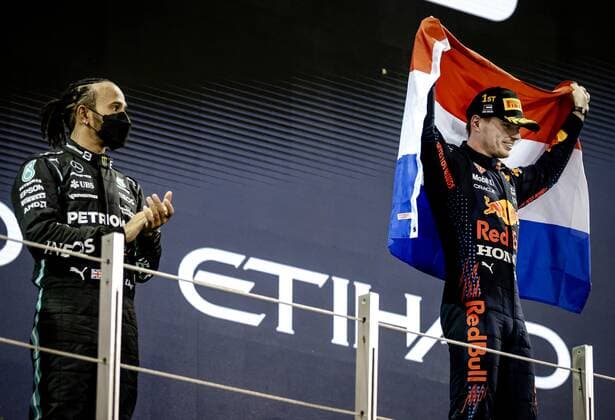 ABU DHABI Mercedes Lewis Hamilton and Red Bull Racing s Max Verstappen on the podium after winning the Formula 1 World Championship after the Abu Dhabi Grand Prix at Yas Marina Circuit on December 12, 2021 in Abu Dhabi, United Arab Emirates REMKO DE WAAL F1 Grand Prix 2021 xVIxANPxSportx xxANPxIVx 441985802