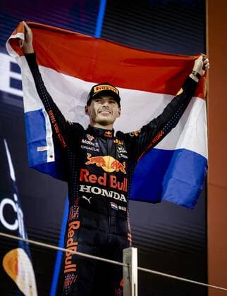 ABU DHABI Red Bull Racing s Max Verstappen on the podium after winning the Formula 1 World Championship after the Abu Dhabi Grand Prix at Yas Marina Circuit on December 12, 2021 in Abu Dhabi, United Arab Emirates REMKO DE WAAL F1 Grand Prix 2021 xVIxANPxSportx xxANPxIVx 441986687