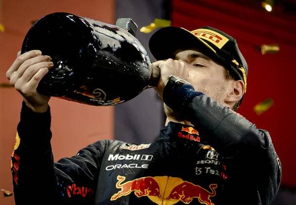 ABU DHABI Red Bull Racing s Max Verstappen on the podium after winning the Formula 1 World Championship after the Abu Dhabi Grand Prix at Yas Marina Circuit on December 12, 2021 in Abu Dhabi, United Arab Emirates REMKO DE WAAL F1 Grand Prix 2021 xVIxANPxSportx xxANPxIVx 441988291