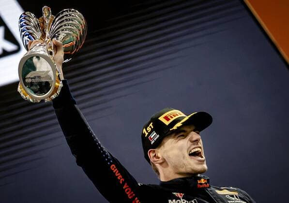 ABU DHABI Red Bull Racing s Max Verstappen on the podium after winning the Formula 1 World Championship after the Abu Dhabi Grand Prix at Yas Marina Circuit on December 12, 2021 in Abu Dhabi, United Arab Emirates REMKO DE WAAL F1 Grand Prix 2021 xVIxANPxSportx xxANPxIVx 441988297