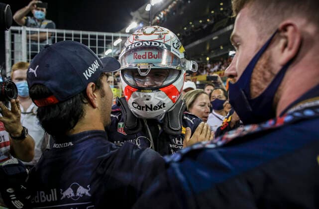 33 Max Verstappen NED, Red Bull Racing celebrates becoming the 2021 Drivers World Champion with 11 Sergio Perez MEX, Red Bull Racing , F1 Grand Prix of Abu Dhabi at Yas Marina Circuit on December 12, 2021 in Abu Dhabi, United Arab Emirates Photo by HOCH ZWEI Abu Dhabi United Arab Emirates