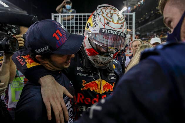 33 Max Verstappen NED, Red Bull Racing celebrates becoming the 2021 Drivers World Champion with 11 Sergio Perez MEX, Red Bull Racing , F1 Grand Prix of Abu Dhabi at Yas Marina Circuit on December 12, 2021 in Abu Dhabi, United Arab Emirates Photo by HOCH ZWEI Abu Dhabi United Arab Emirates