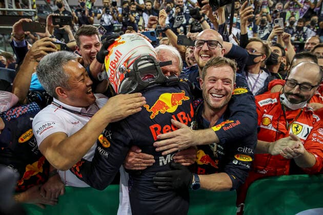 33 Max Verstappen NED, Red Bull Racing celebrates becoming the 2021 Drivers World Champion with Masashi Yamamoto JPN, F1 General Manager Honda , Dr Helmut Marko AUT, Red Bull Racing , F1 Grand Prix of Abu Dhabi at Yas Marina Circuit on December 12, 2021 in Abu Dhabi, United Arab Emirates Photo by HOCH ZWEI Abu Dhabi United Arab Emirates