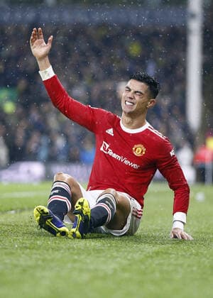 Cristiano Ronaldo of Manchester United, ManU lies in agony after hurting his back during the Premier League match between Norwich City and Manchester United at Carrow Road Where: Norwich, Norfolk, United Kingdom When: 11 Dec 2021 Credit: Mick Kearns phcimages Cover Images **NOT AVAILABLE FOR PUBLICATION IN UK NEWSPAPERS** Copyright: xMickxKearns phcimages CoverxImagesx 51004779 EDITORIAL USE ONLY. RESTRICTED TO NEWSPAPERS BASED IN THE UK