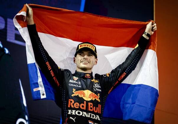 ABU DHABI Red Bull Racing s Max Verstappen on the podium after winning the Formula 1 World Championship after the Abu Dhabi Grand Prix at Yas Marina Circuit on December 12, 2021 in Abu Dhabi, United Arab Emirates REMKO DE WAAL F1 Grand Prix 2021 xVIxANPxSportx xxANPxIVx 441986180