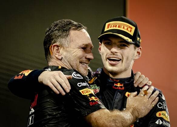 ABU DHABI Team boss Christian Horner and Max Verstappen of Red Bull Racing on the podium after winning the Formula 1 World Championship after the Abu Dhabi Grand Prix at Yas Marina Circuit on December 12, 2021 in Abu Dhabi, United Arab Emirates REMKO DE WAAL F1 Grand Prix 2021 xVIxANPxSportx xxANPxIVx 441988284