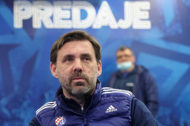 GNK Dinamo Zagreb Drawn Against Sevilla in UEFA Europa League Playy-Off Round Head coach of GNK Dinamo Zeljko Kopic watch livestream of the UEFA Europa League knockout round play-off draw, on December 13, 2021, in Zagreb, Croatia. GNK Dinamo Zagreb will play against Sevilla FC on February 17th and the return leg on the 24th February. GoranxStanzl PIXSELL