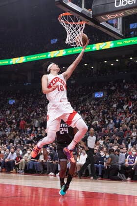 December 13, 2021, Toronto, ON, CANADA: Toronto Raptors Yuta Watanabe (18) scores on Sacramento Kings Buddy Hield during first half NBA, Basketball Herren, USA basketball action in Toronto, Monday, Dec. 13, 2021. Yuta Watanabe ; Buddy Hield  - ZUMAc35_ 20211213_zaf_c35_104 Copyright: xChrisxYoungx
