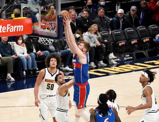 Washington Wizards forward Davis Bertans (C) goes in for the dunk against Denver Nuggets guard Facundo Campazzo (C-L), during a NBA, Basketball Herren, USA game at the Ball Arena in Denver, Colorado, USA, 13 December 2021. Washington Wizards at Denver Nuggets !ACHTUNG: NUR REDAKTIONELLE NUTZUNG!  Copyright: xToddxPiersonx AME4285 20211214-3758d78028b7ab666e0a20e2cce3d0f57a8695f0
