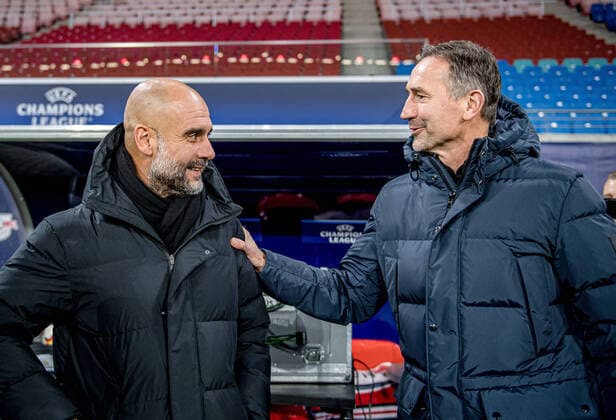 Leipzig co-coach Achim Beierlorzer with Manchester coach Pep Guardiola Football UEFA Champions League, matchday 6 RB Leipzig Manchester City 2 1 7 December 2021 Leipzig Saxony , Red Bull Arena RB Leipzig Manchester City 2 1