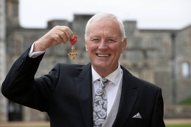 Barry Hearn presents his OBE after the award ceremony