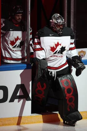 MOSCOW, RUSSIA â€“ DECEMBER 15, 2021: Canada s forward Philippe Maillet (L) and goaltender Justin Pogge step on the ice ahead of their 2021 22 Euro Hockey Tour Channel One Cup Ice hockey, Eishockey match against Russia at the CSKA Arena. Valery Sharifulin TASS  TS11BE42