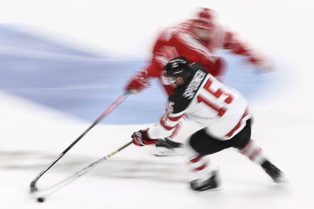 MOSCOW, RUSSIA â€“ DECEMBER 15, 2021: Canada s Ryan Spooner (front) in their 2021 22 Euro Hockey Tour Channel One Cup Ice hockey, Eishockey match against Russia at the CSKA Arena. Valery Sharifulin TASS  TS11BE92