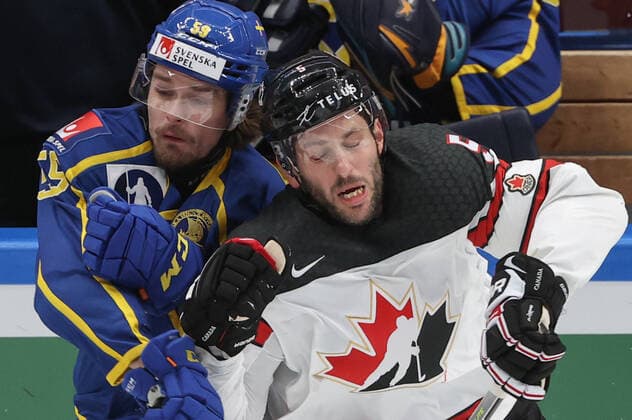 MOSCOW, RUSSIA â€“ DECEMBER 17, 2021: Swedenâ€™s Linus Johansson (L) and Canadaâ€™s Jason Demers in their national teamsâ€™ 2021 Channel One Cup Ice hockey, Eishockey match at CSKA Arena as part of the 2021 22 Euro Hockey Tour. Valery Sharifulin TASS  TS11C29F