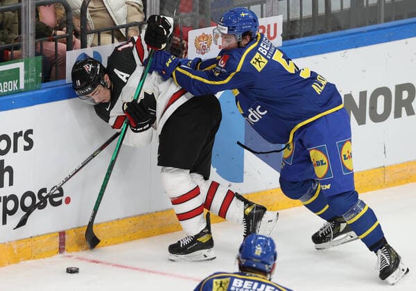 MOSCOW, RUSSIA â€“ DECEMBER 17, 2021: Canadaâ€™s Jordan Weal (L) and Swedenâ€™s Adam Almqvist in their national teamsâ€™ 2021 Channel One Cup Ice hockey, Eishockey match at CSKA Arena as part of the 2021 22 Euro Hockey Tour. Valery Sharifulin TASS  TS11C2A8