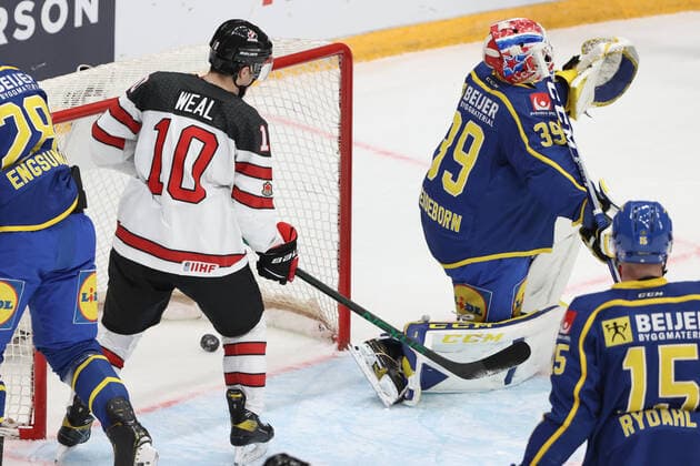 MOSCOW, RUSSIA â€“ DECEMBER 17, 2021: Swedenâ€™s Adam Reideborn (R back) concedes a goal in his national team, Nationalteam s 2021 Channel One Cup Ice hockey, Eishockey match against Canada at CSKA Arena as part of the 2021 22 Euro Hockey Tour. Valery Sharifulin TASS  TS11C2BD