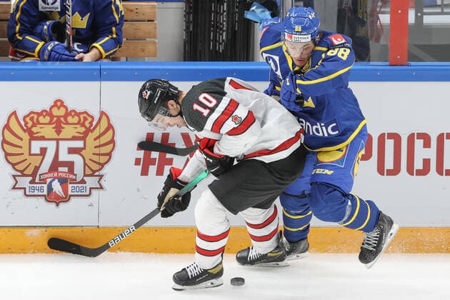 MOSCOW, RUSSIA â€“ DECEMBER 17, 2021: Canadaâ€™s Jordan Weal (L) and Swedenâ€™s Malte Stromwall in their national teamsâ€™ 2021 Channel One Cup Ice hockey, Eishockey match at CSKA Arena as part of the 2021 22 Euro Hockey Tour. Valery Sharifulin TASS  TS11C337