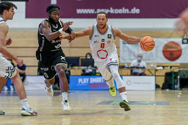 Barmer 2 Basketball Bundesliga ProB, Rheinstars Koeln vs WWU Baskets Muenster, 18 12 2021 Ryan Timothy Richmond WWU Baskets Muenster 0 , Andrej Mangold RheinStars Koeln 0 , Barmer 2 Basketball Bundesliga ProB, Rheinstars Koeln vs WWU Baskets Muenster on 18 12 2021 at ASV Koeln in Koeln Nordrhein Westfalen Copyright: xBEAUTIFULxSPORTS Mueller-Laschetx
