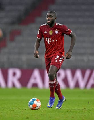 17 12 2021, Football 1 Bundesliga 2021 2022, 17 Matchday, FC Bayern München VfL Wolfsburg, at Allianz Arena Munich Dayot Upamecano FC Bayern München on the ball DFL and DFB regulations prohibit any use of photographs as image sequences and or quasi video