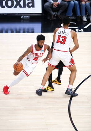 CHICAGO, IL - DECEMBER 20: Chicago Bulls Guard Coby White (0) dribbles the ball in action during a NBA, Basketball Herren, USA game between the Houston Rockets and the Chicago Bulls on December 20, 2021 at the United Center in Chicago, IL. (Photo by Melissa Tamez Icon Sportswire) NBA: DEC 20 Rockets at Bulls Icon2112201818