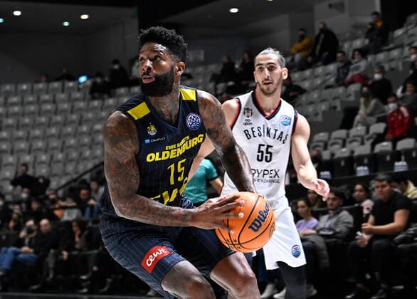 Kenan Sipahi (55) of Besiktas Icrypex and Cameron Clark (15) of Ewe Baskets Oldenburg during the FIBA Champions League group H match between Besiktas Icrypex and Ewe Baskets Oldenburg at Besiktas Akatlar Arena in Istanbul , Turkey on December 21 , 2021. ( Photo by Seskimphoto ) 