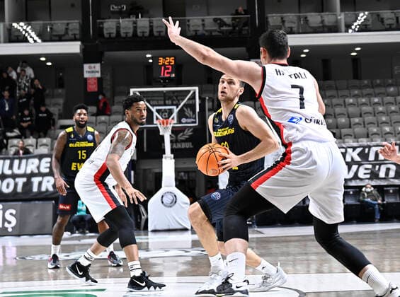 Furkan Haltali (7) of Besiktas Icrypex and Michal Michalak (20) of Ewe Baskets Oldenburg during the FIBA Champions League group H match between Besiktas Icrypex and Ewe Baskets Oldenburg at Besiktas Akatlar Arena in Istanbul , Turkey on December 21 , 2021. ( Photo by Seskimphoto ) 