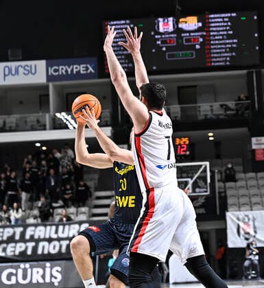 Furkan Haltali (7) of Besiktas Icrypex and Michal Michalak (20) of Ewe Baskets Oldenburg during the FIBA Champions League group H match between Besiktas Icrypex and Ewe Baskets Oldenburg at Besiktas Akatlar Arena in Istanbul , Turkey on December 21 , 2021. ( Photo by Seskimphoto ) 