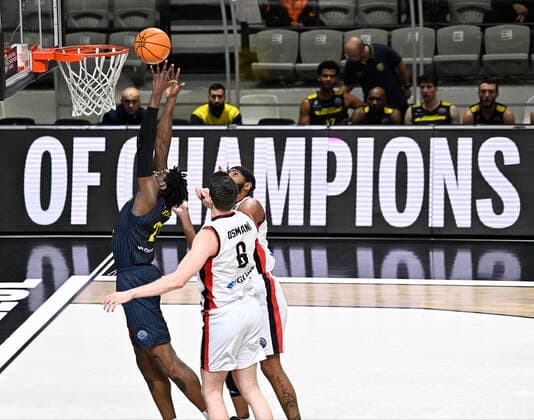 Ercan Osmani (6) , Isaiah Whitehead (15) of Besiktas Icrypex and TJ Holyfield of Ewe Baskets Oldenburg during the FIBA Champions League group H match between Besiktas Icrypex and Ewe Baskets Oldenburg at Besiktas Akatlar Arena in Istanbul , Turkey on December 21 , 2021. ( Photo by Seskimphoto ) 