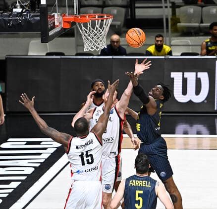 Ercan Osmani (6) , Isaiah Whitehead (15) of Besiktas Icrypex and TJ Holyfield of Ewe Baskets Oldenburg during the FIBA Champions League group H match between Besiktas Icrypex and Ewe Baskets Oldenburg at Besiktas Akatlar Arena in Istanbul , Turkey on December 21 , 2021. ( Photo by Seskimphoto ) 