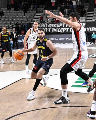 Furkan Haltali of Besiktas Icrypex and Matt Farrell (5) of Ewe Baskets Oldenburg during the FIBA Champions League group H match between Besiktas Icrypex and Ewe Baskets Oldenburg at Besiktas Akatlar Arena in Istanbul , Turkey on December 21 , 2021. ( Photo by Seskimphoto ) 
