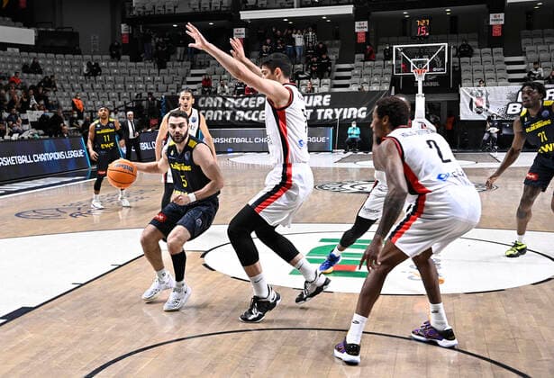 Furkan Haltali of Besiktas Icrypex and Matt Farrell (5) of Ewe Baskets Oldenburg during the FIBA Champions League group H match between Besiktas Icrypex and Ewe Baskets Oldenburg at Besiktas Akatlar Arena in Istanbul , Turkey on December 21 , 2021. ( Photo by Seskimphoto ) 