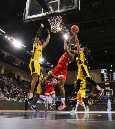 Ludwigsburg , Basketball Champions League MHP Riesen Ludwigsburg vs BC Prometey , from left Jonathan Bähre Riesen D Angelo Harris Prometey Jonah Radebaugh Riesen