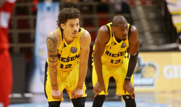 Ludwigsburg , Basketball Champions League MHP Riesen Ludwigsburg vs BC Prometey , from left Jonah Radebaugh Yorman Polas bartolo Giants