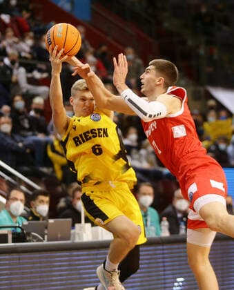 Ludwigsburg , Basketball Champions League MHP Riesen Ludwigsburg vs BC Prometey , from left Johannes Patrick Riesen Oleksandr Lypovyy Prometey