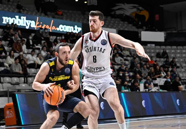Ercan Osmani (6) of Besiktas Icrypex and Max Heidegger (L) of Ewe Baskets Oldenburg during the FIBA Champions League group H match between Besiktas Icrypex and Ewe Baskets Oldenburg at Besiktas Akatlar Arena in Istanbul , Turkey on December 21 , 2021. ( Photo by Seskimphoto ) 