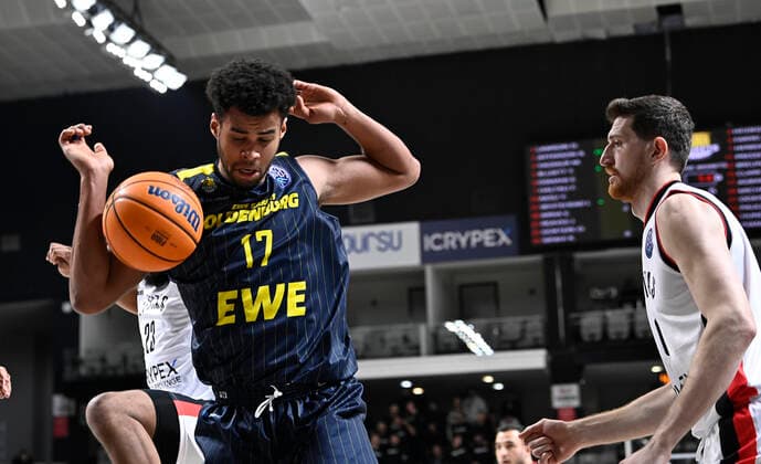 Ercan Osmani (6) of Besiktas Icrypex and Norris Agbakoko (17) of Ewe Baskets Oldenburg during the FIBA Champions League group H match between Besiktas Icrypex and Ewe Baskets Oldenburg at Besiktas Akatlar Arena in Istanbul , Turkey on December 21 , 2021. ( Photo by Seskimphoto ) 