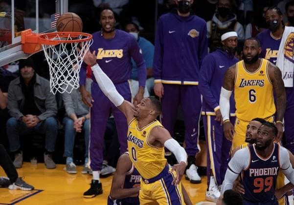 Russell Westbrook 0 of the Los Angeles Lakers puts up a layup during their NBA, Basketball Herren, USA game with the Phoenix Suns on Tuesday December 21, 2021 at the Staples Center in Los Angeles, California. Lakers defeat Suns, 108-90. Lakers vs Suns !ACHTUNG: NUR REDAKTIONELLE NUTZUNG!  Copyright: xJAVIERxROJASx GRAF986 20211222-bb6834950f65f6a273fbb15307038d95a4345858