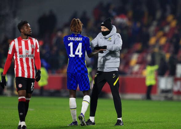 22nd December 2021; Brentford Community Stadium, London, England; EFL Cup Football Brentford versus Chelsea; Chelsea manager Thomas Tuchel congratulates Trevoh Chalobah of Chelsea after full time  ActionPlus12350108 JohnxPatrickxFletcher