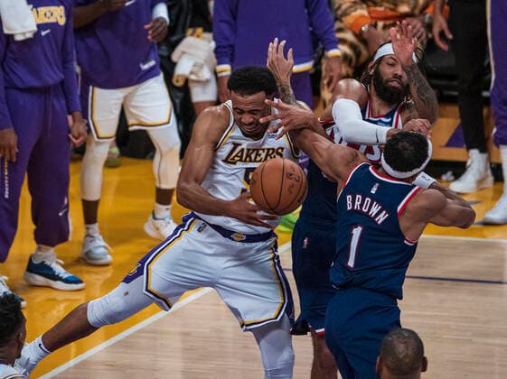 December 25, 2021, Los Angeles, California, USA: Talen Horton-Tucker 5 of the Los Angeles Lakers battles for a rebound with Bruce Brown 1 of the Brooklyn Nets during their NBA, Basketball Herren, USA home game on Saturday December 25, 2021 at Crypto.com Arena in Los Angeles, California. Lakers lose to Nets, 115-122. PI Los Angeles USA - ZUMAp124 20211225_zaa_p124_008 Copyright: xJAVIERxROJASx