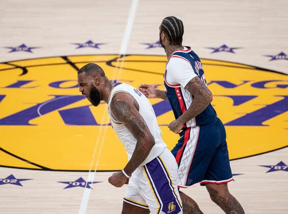 December 25, 2021, Los Angeles, California, USA: LeBron James 6 of the Los Angeles Lakers reacts after scoring a three pointer during their NBA, Basketball Herren, USA home game against the Brooklyn Nets on Saturday December 25, 2021 at Crypto.com Arena in Los Angeles, California. Lakers lose to Nets, 115-122. PI Los Angeles USA - ZUMAp124 20211225_zaa_p124_022 Copyright: xJAVIERxROJASx