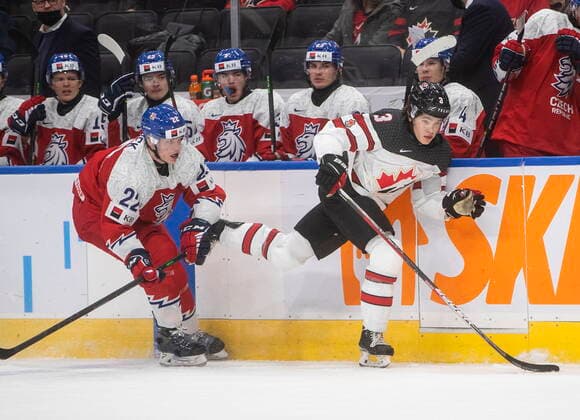 December 26, 2021, EDMONTON, AB, CANADA: Canada s Olen Zellweger (3) is checked by Czech Republic s Michal Hradek (22) during third period IIHF World Junior Hockey Championship action in Edmonton on Sunday, December 26, 2021. Olen Zellweger Michal Hradek  - ZUMAc35_ 20211226_zaf_c35_100 Copyright: xJasonxFransonx