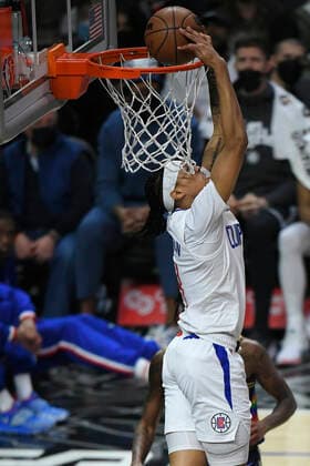 LOS ANGELES, CA - DECEMBER 26: Los Angeles Clippers guard Brandon Boston Jr. (4) dunks the ball while the Denver Nuggets look on in the first half of an NBA, Basketball Herren, USA game on December 26, 2021, at Crypto.com Arena in Los Angeles, CA. (Photo by John McCoy Icon Sportswire) NBA: DEC 26 Nuggets at Clippers Icon2112260927