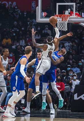 December 27, 2021, Los Angeles, California, USA: Terance Mann 14 of the Los Angeles Clippers is unable to stop a shot by DeAndre Bembry 95 of the Brooklyn Nets during their NBA, Basketball Herren, USA game at Crypto.com Arena on Monday December 27, 2021 in Los Angeles, California. Clippers lose to Nets, 108-124. PI Los Angeles USA - ZUMAp124 20211227_zaa_p124_035 Copyright: xJAVIERxROJASx