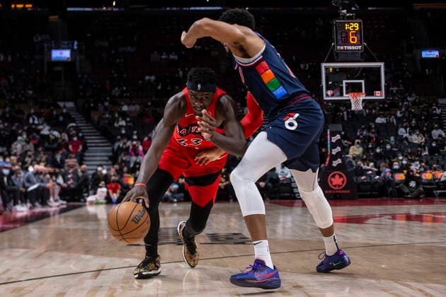 December 28, 2021, Toronto, ON, Canada: Toronto Raptors Pascal Siakam (left) protects the ball from Philadelphia 76ers Tobias Harris during first half NBA, Basketball Herren, USA basketball action in Toronto on Tuesday, December 28, 2021. Pascal Siakam ; Tobias Harris  - ZUMAc35_ 20211228_zaf_c35_068 Copyright: xChrisxYoungx