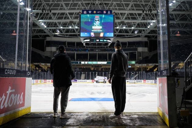 211229 Oskar Olausson and Simon Edvinsson of Sweden look out on the ice after the 2022 IIHF World Junior Championship was cancelled due to the coronavirus pandemic on December 29, 2021 in Red Deer Photo Joel Marklund BILDBYRAN kod JM JM0253 bbeng ishockey ice hockey jvm junior vm u20 2022 iihf world junior championship world juniors sverige sweden covid 19,  Copyright: JOELxMARKLUND BB211229JM046